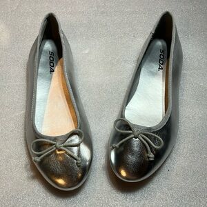 Soft upper silver pu ballerina flats. Size 10.